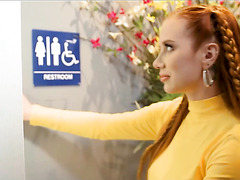 Busty Redhead Gets Excited With Dicks Of Two Sexy Trans Girls In The Gloryholes Of Public Toilet